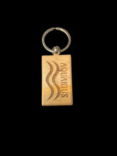 Load image into Gallery viewer, Wooden Laser Engraved Zodiac Keychain by Blaise the Witch - Witch Chest